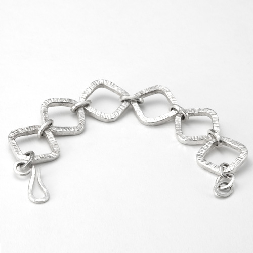 Cross Forged Link Bracelet in silver by Tamberlaine