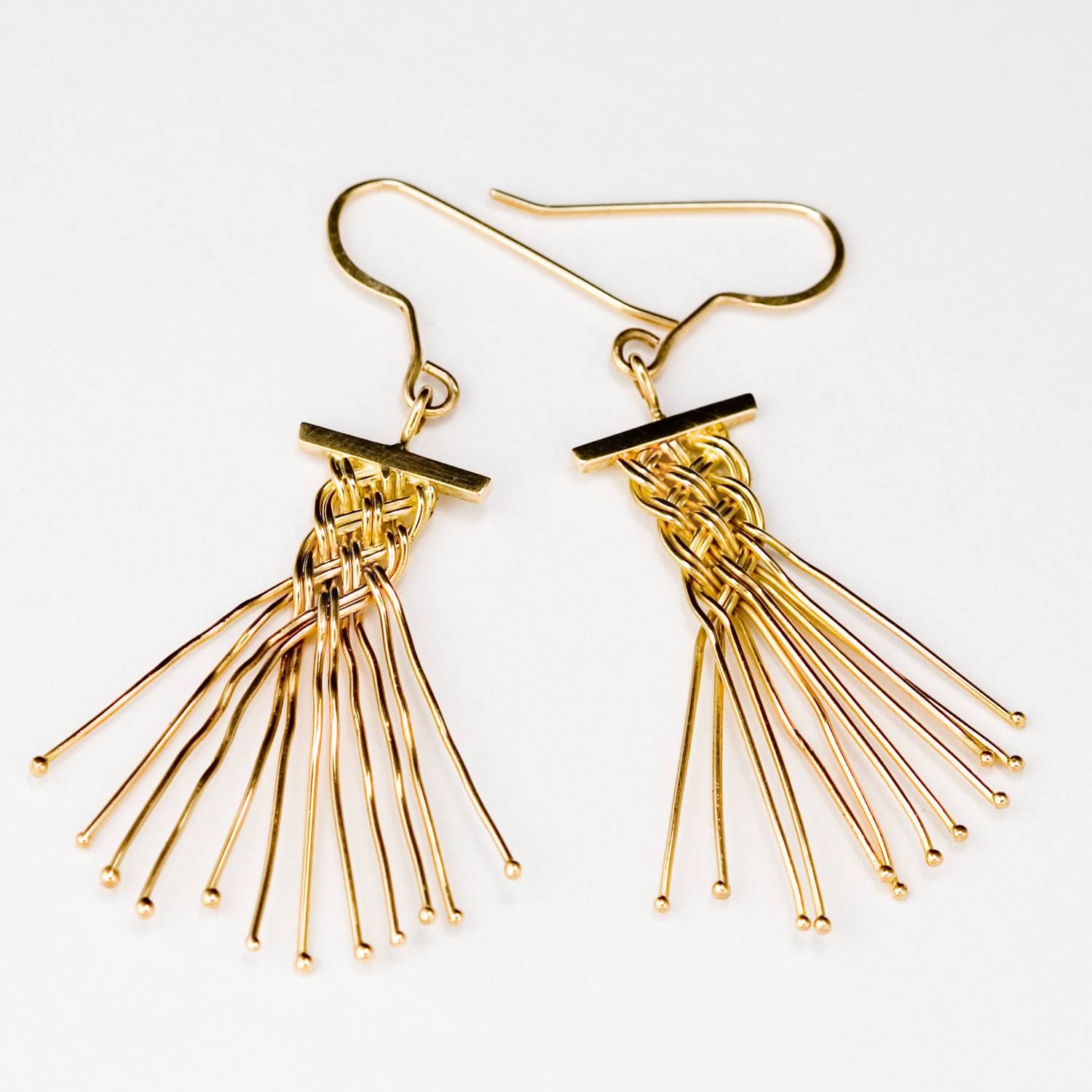 Sunburst Weave Stud Earrings in 18k gold with diamonds by Tamberlaine